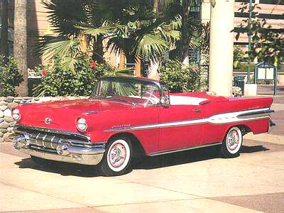 1957_Pontiac_Star_Chief_Convertible_Red_Frt_Qtr